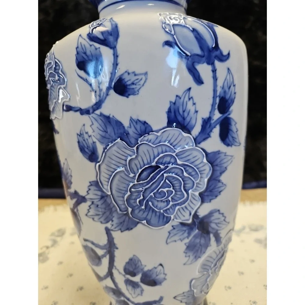 Blue and White Vase with Roses, Roses are outlined in the pottery so they show